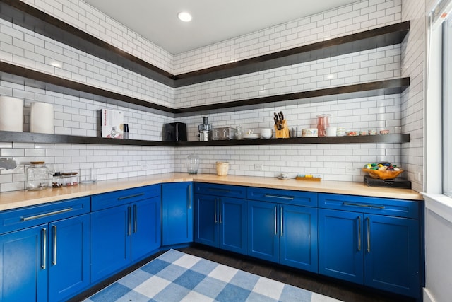 1210 Emerald Sound Blvd, Oak Point, TX 75068 - kitchen featuring open shelves, blue cabinets, tasteful backsplash, and recessed lighting