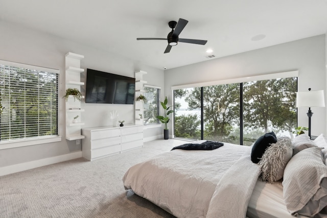 1210 Emerald Sound Blvd, Oak Point, TX 75068 - carpeted bedroom with baseboards and ceiling fan