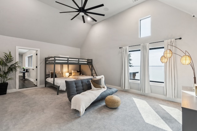 1210 Emerald Sound Blvd, Oak Point, TX 75068 - carpeted bedroom featuring multiple windows, baseboards, and high vaulted ceiling