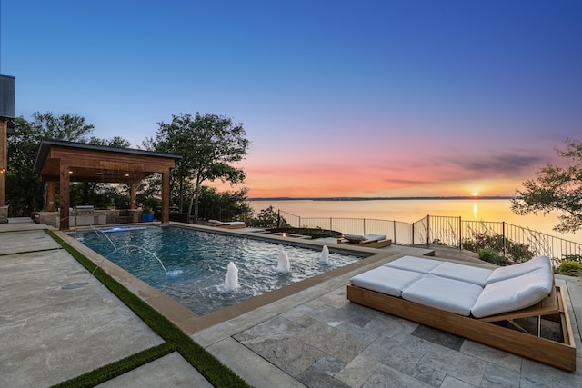 1210 Emerald Sound Blvd, Oak Point, TX 75068 - pool at dusk featuring a gazebo, a patio area, and a water view