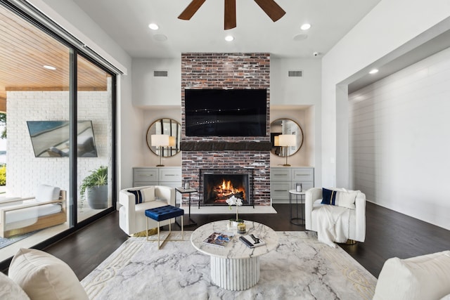 1210 Emerald Sound Blvd, Oak Point, TX 75068 - living room featuring a brick fireplace, wood finished floors, ceiling fan, and recessed lighting