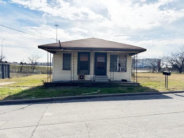 5414 Blackhawk, Dallas, TX 75212 - bungalow featuring a front lawn and cooling unit