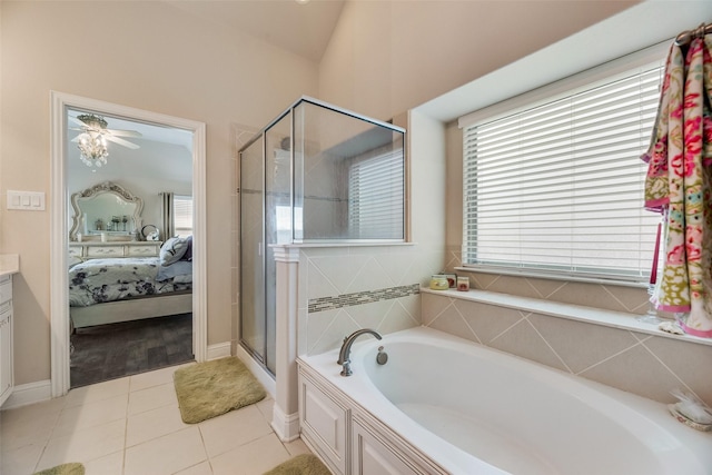 1537 Firenza Ct, Mclendon Chisholm, TX 75032 - ensuite bathroom with a garden tub, a shower stall, tile patterned flooring, and baseboards
