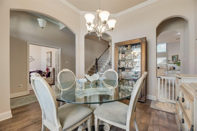 1537 Firenza Ct, Mclendon Chisholm, TX 75032 - dining space with arched walkways, ornamental molding, dark wood-style flooring, baseboards, and stairs