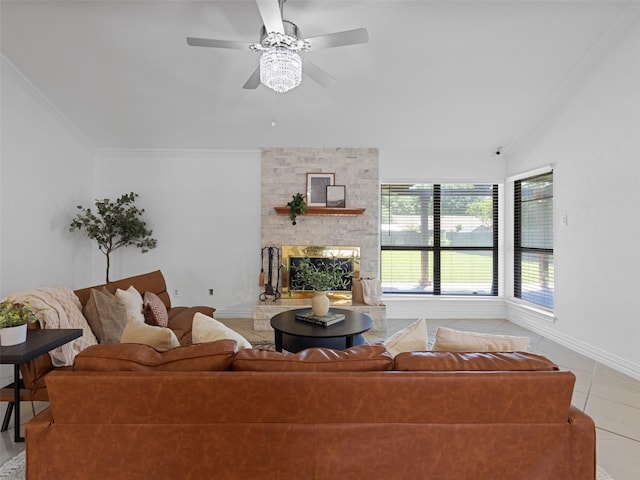 3804 Chestnut St, Fort Worth, TX 76137 - living area featuring ornamental molding, baseboards, ceiling fan, a stone fireplace, and light tile patterned floors