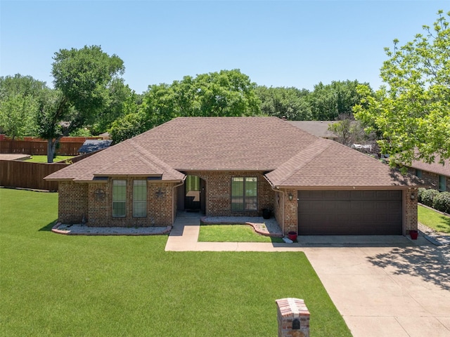 3804 Chestnut St, Fort Worth, TX 76137 - ranch-style home featuring an attached garage, concrete driveway, brick siding, and a shingled roof