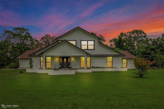 4131 Waller Dr, Shreveport, LA 71119 - back of house with a lawn and covered porch