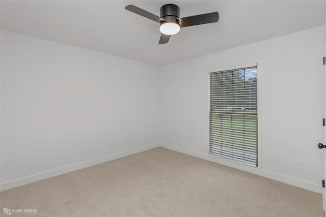 4131 Waller Dr, Shreveport, LA 71119 - empty room with light colored carpet, a ceiling fan, and baseboards