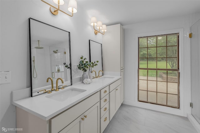 4131 Waller Dr, Shreveport, LA 71119 - bathroom with a shower with door, marble look tile flooring, double vanity, and a chandelier