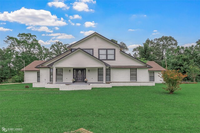 4131 Waller Dr, Shreveport, LA 71119 - view of front of house featuring concrete driveway, a front lawn, a porch, and stucco siding