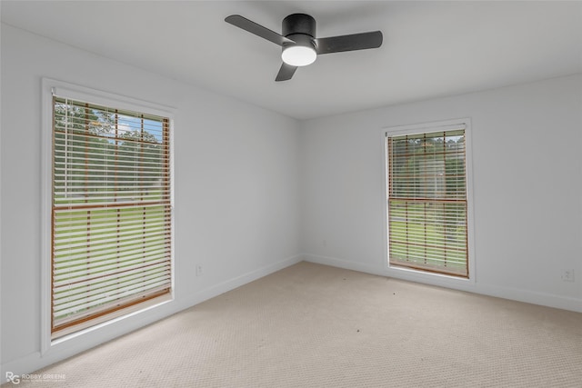 4131 Waller Dr, Shreveport, LA 71119 - unfurnished room with light colored carpet, ceiling fan, and baseboards