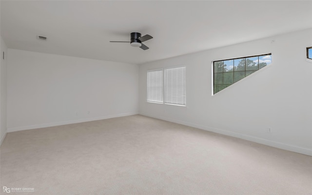 4131 Waller Dr, Shreveport, LA 71119 - unfurnished room featuring light carpet, ceiling fan, and baseboards