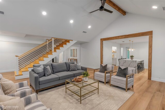 4131 Waller Dr, Shreveport, LA 71119 - living room with ceiling fan, beam ceiling, light wood-type flooring, stairway, and recessed lighting
