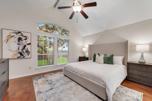 907 Sunpoint Cir, Rockwall, TX 75087 - bedroom with wood finished floors, high vaulted ceiling, beamed ceiling, a ceiling fan, and baseboards
