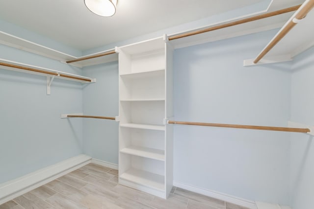 907 Sunpoint Cir, Rockwall, TX 75087 - spacious closet with wood finish floors