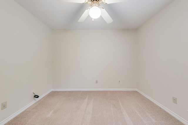 907 Sunpoint Cir, Rockwall, TX 75087 - empty room featuring light colored carpet, a ceiling fan, and baseboards