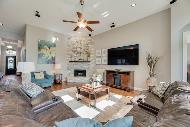106 Magnolia Ln, Hickory Creek, TX 75065 - living area featuring ceiling fan, light wood-type flooring, a fireplace, baseboards, and recessed lighting