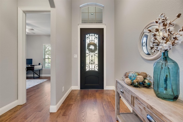 106 Magnolia Ln, Hickory Creek, TX 75065 - entrance foyer with wood finished floors and baseboards