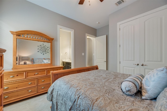 106 Magnolia Ln, Hickory Creek, TX 75065 - bedroom featuring a closet, light colored carpet, ceiling fan, and ensuite bath
