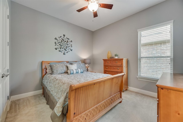 106 Magnolia Ln, Hickory Creek, TX 75065 - bedroom featuring light carpet, baseboards, and ceiling fan