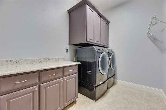 106 Magnolia Ln, Hickory Creek, TX 75065 - laundry area featuring cabinet space, independent washer and dryer, and baseboards