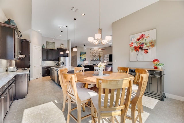 106 Magnolia Ln, Hickory Creek, TX 75065 - dining space featuring a chandelier, light tile patterned floors, recessed lighting, and baseboards