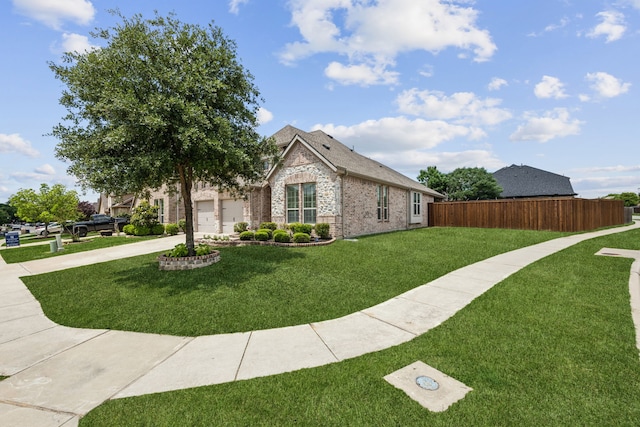5400 Fringetree Dr, Mckinney, TX 75071 - view of front of home with brick siding, driveway, and a garage
