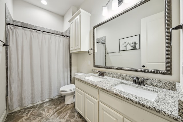 5400 Fringetree Dr, Mckinney, TX 75071 - full bathroom with toilet, marble finish floors, and double vanity