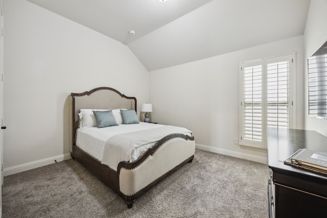 5400 Fringetree Dr, Mckinney, TX 75071 - carpeted bedroom featuring lofted ceiling and baseboards