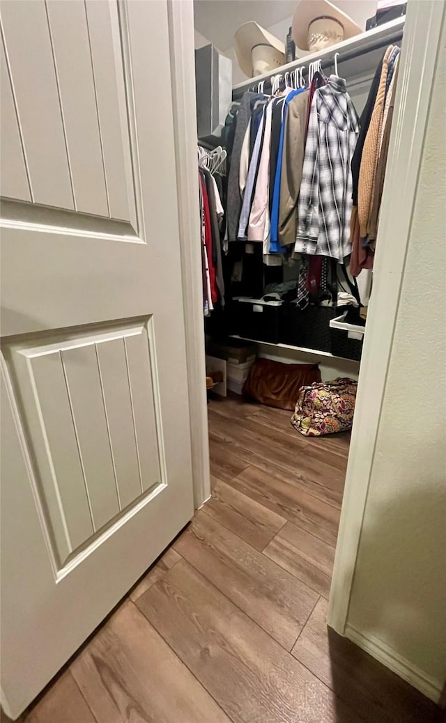 14340 Cloudview Way, Fort Worth, TX 76052 - walk in closet featuring wood finished floors