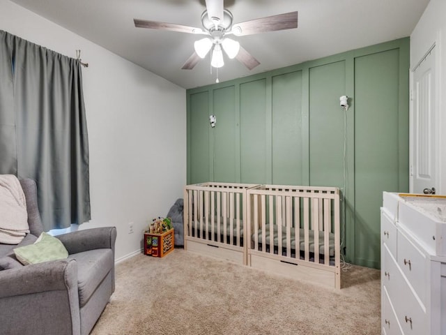 14340 Cloudview Way, Fort Worth, TX 76052 - bedroom with carpet, a nursery area, a decorative wall, and ceiling fan