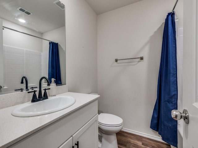 14340 Cloudview Way, Fort Worth, TX 76052 - full bath featuring wood finished floors, vanity, a shower with shower curtain, toilet, and baseboards