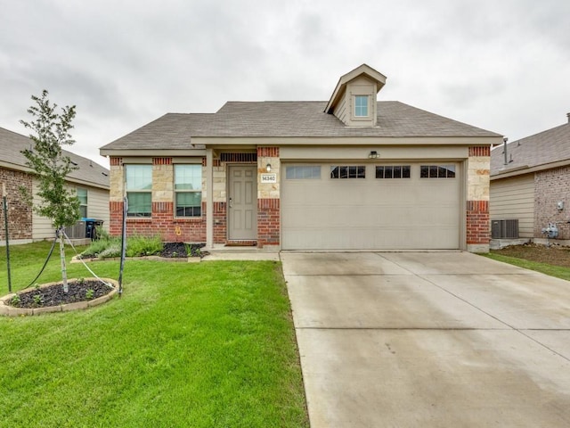 14340 Cloudview Way, Fort Worth, TX 76052 - view of front of home with central air condition unit, driveway, a front lawn, a garage, and brick siding