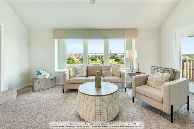 living area featuring carpet, lofted ceiling, and baseboards