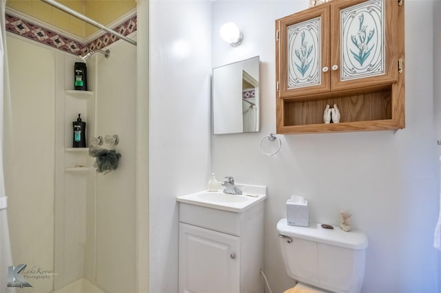 350 County Road 606 Unit B, Tuscola, TX 79562 - bathroom with a shower stall, toilet, and vanity