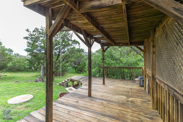 350 County Road 606 Unit B, Tuscola, TX 79562 - wooden deck with a lawn and view of wooded area
