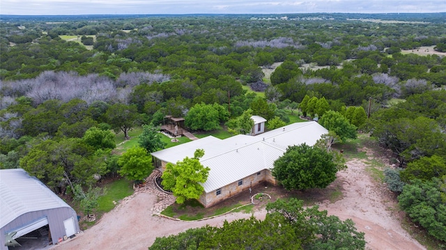 350 County Road 606 Unit B, Tuscola, TX 79562 - aerial view of property and surrounding area with a heavily wooded area