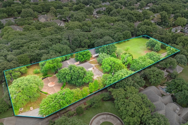 aerial view of property and surrounding area featuring property boundaries highlighted