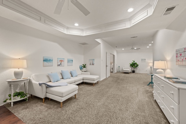 living room with ceiling fan, recessed lighting, baseboards, and light colored carpet