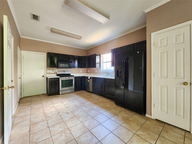 kitchen with black appliances, a sink, a textured ceiling, light tile patterned floors, and light countertops
