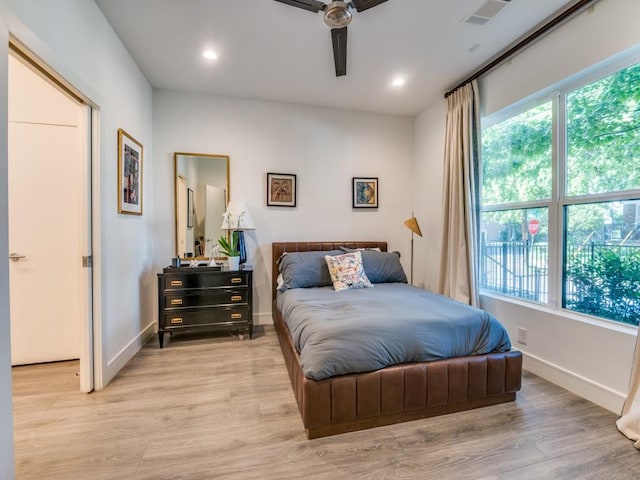 bedroom featuring light wood-style flooring, baseboards, recessed lighting, and ceiling fan