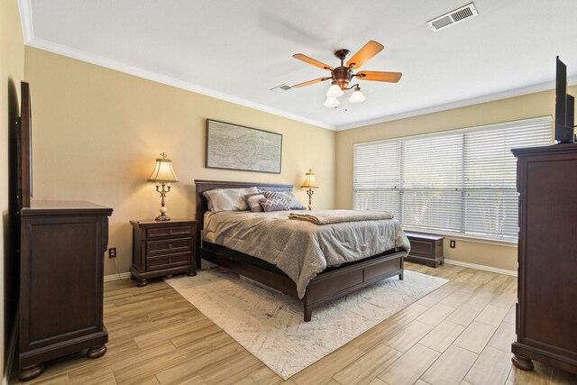 2499 Streamside Ct, Frisco, TX 75036 - bedroom featuring baseboards, ornamental molding, light wood finished floors, and a ceiling fan