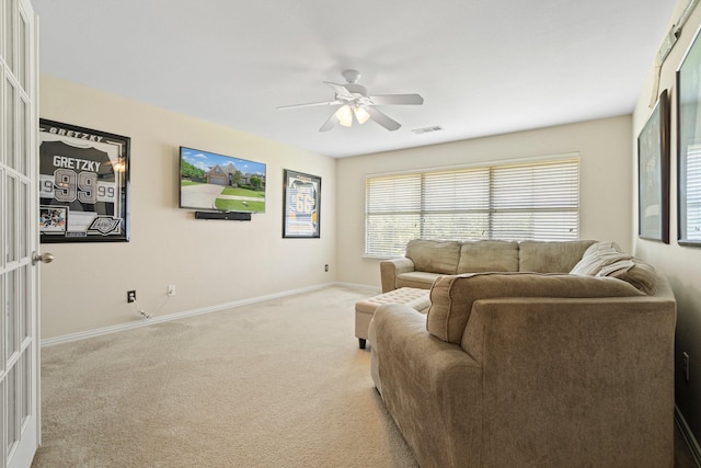 2499 Streamside Ct, Frisco, TX 75036 - living room with light colored carpet, a ceiling fan, and baseboards