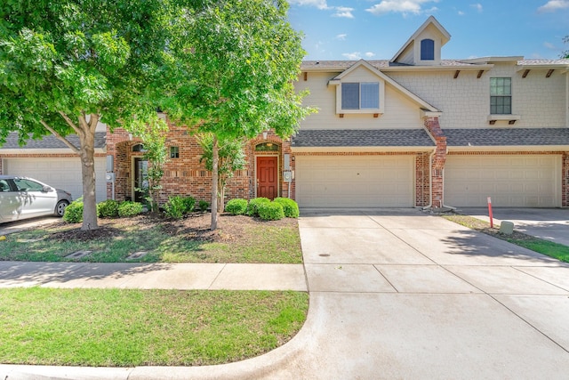 3644 Vienna St, Irving, TX 75038 - view of front of home with brick siding, a garage, a shingled roof, and concrete driveway
