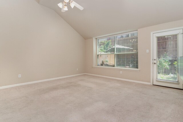 3644 Vienna St, Irving, TX 75038 - empty room with lofted ceiling, light carpet, baseboards, and a ceiling fan
