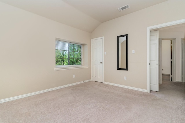 3644 Vienna St, Irving, TX 75038 - unfurnished bedroom with carpet, baseboards, and lofted ceiling
