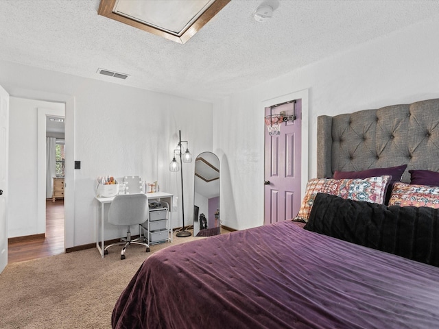 138 Selma Rd, Bowie, TX 76230 - carpeted bedroom featuring a textured ceiling and an office area