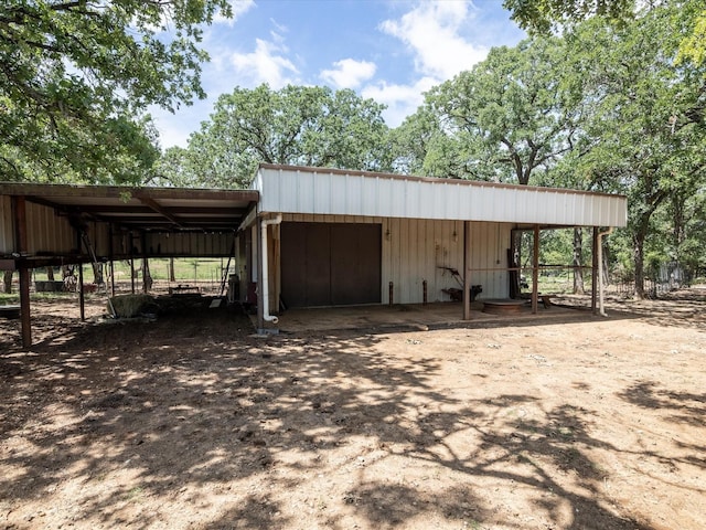 138 Selma Rd, Bowie, TX 76230 - view of outbuilding with a carport and an outbuilding