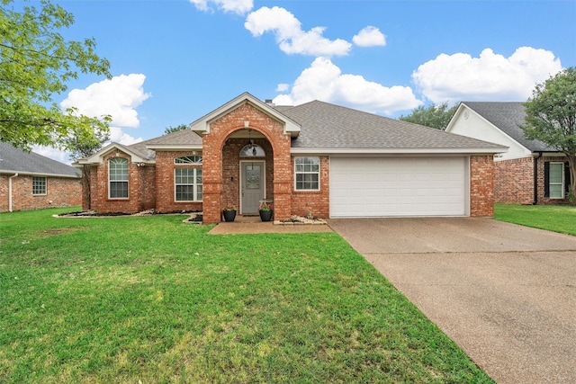 10612 Calaveras Dr, Waco, TX 76708 - single story home featuring an attached garage, driveway, brick siding, and a front lawn