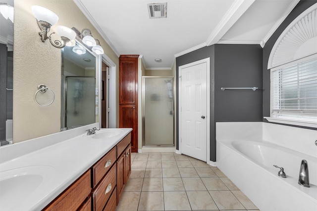 10612 Calaveras Dr, Waco, TX 76708 - full bathroom with crown molding, a stall shower, a bath, double vanity, and tile patterned floors